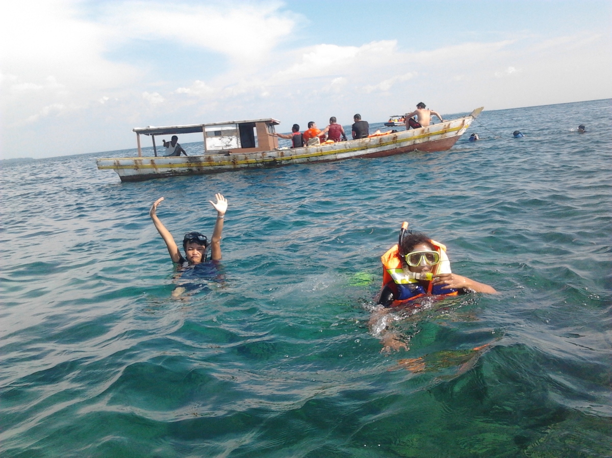 Pose in the middle of the sea with Mrs. Amutha!!